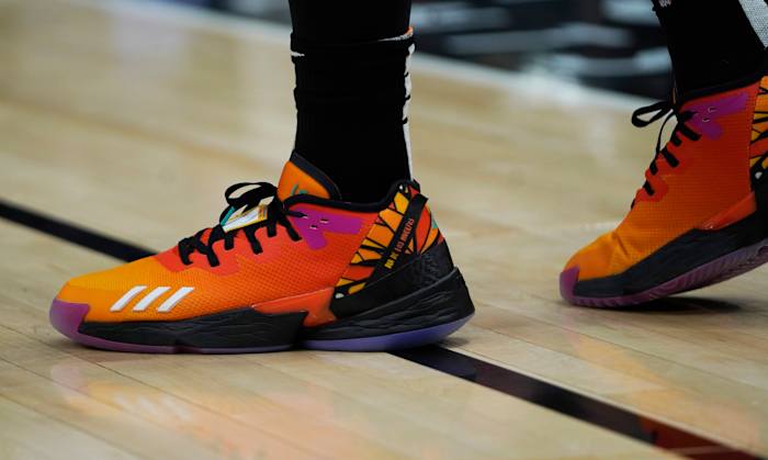 Donovan Mitchell's orange and black shoes.